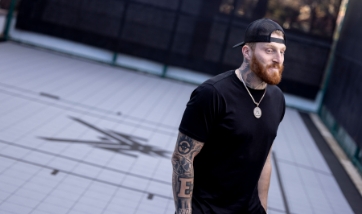 NFL Las Vegas Raiders' Maxx Crosby standing proud on his backyard basketball court