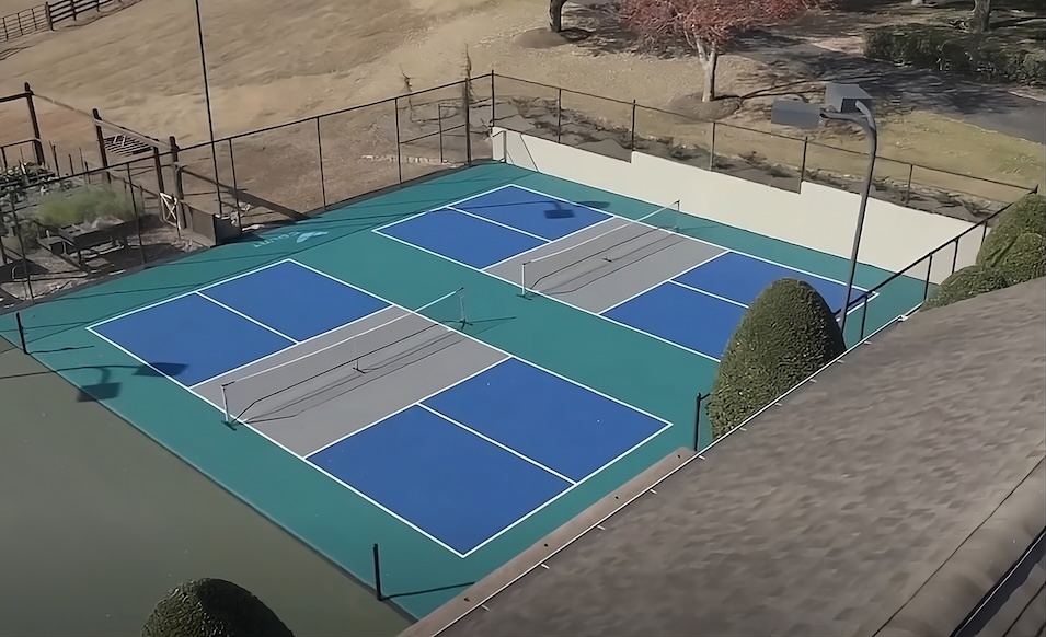 tennis court transformed to pickleball courts
