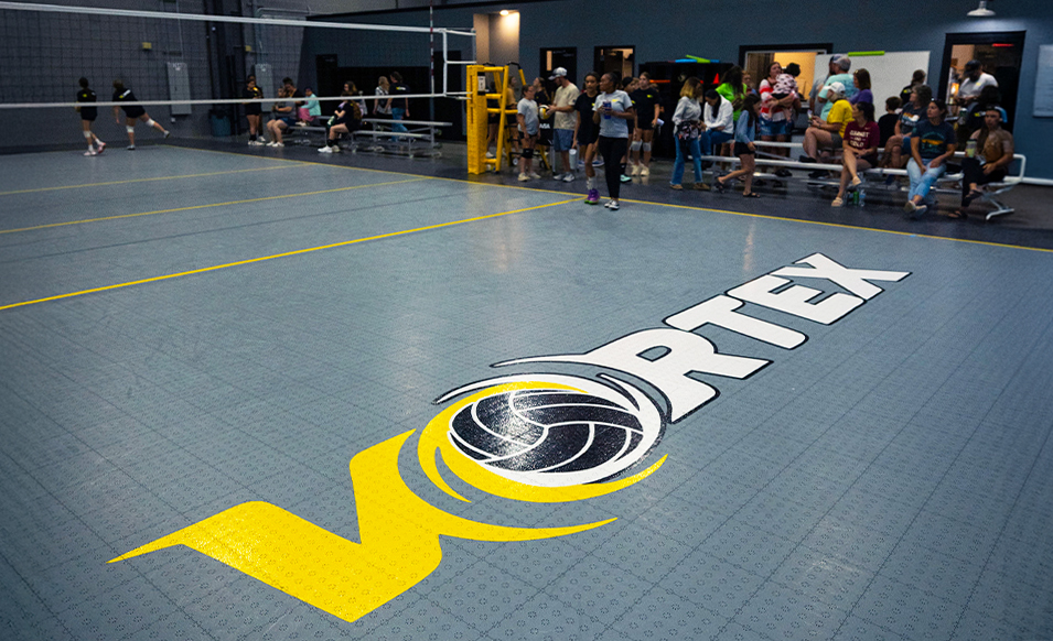 Custom Vortex Volleyball Logo on Gray, Yellow, and Black court