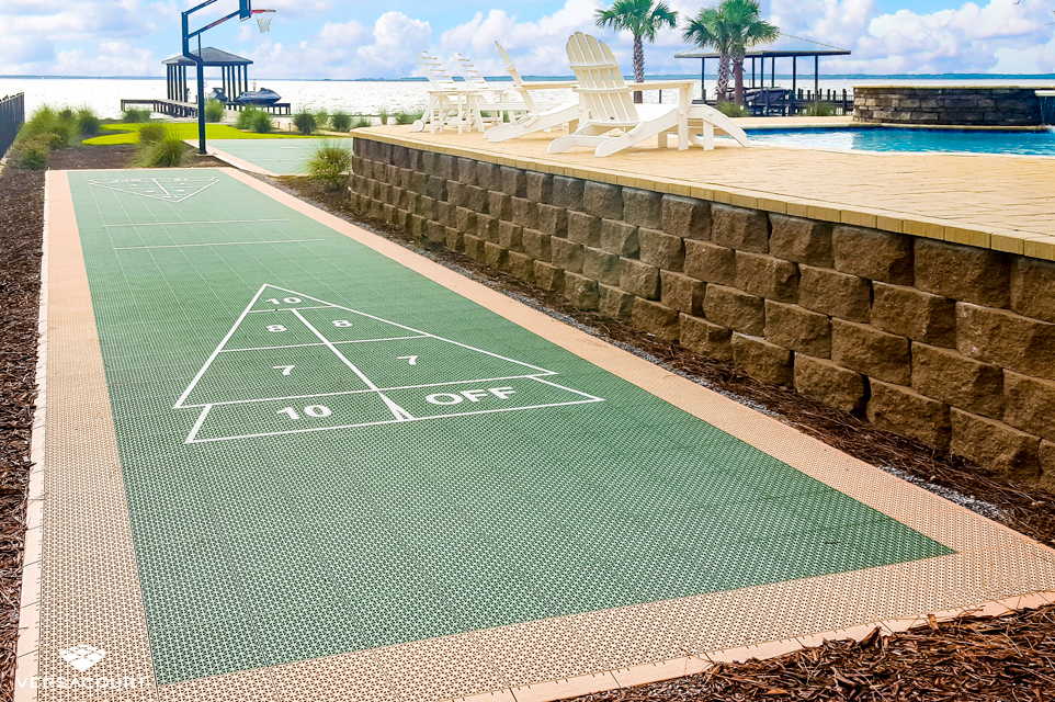 Beachfront yard with a shuffleboard court