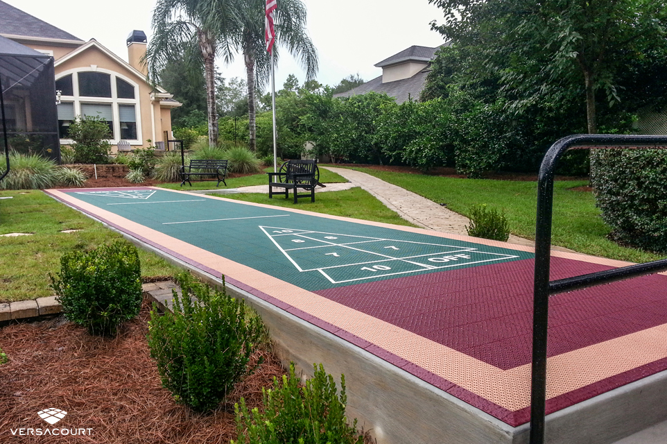 Beachfront home with backyard shuffleboard court