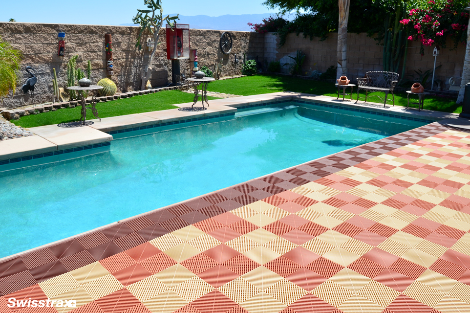 Backyard pool installed with drain thru floor tiles from Swisstrax