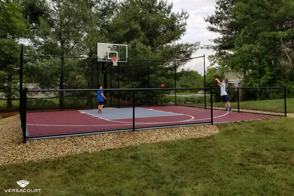 Enclosed backyard basketball court