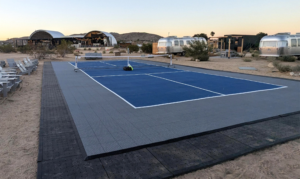 Temporary pickleball court placed on top of Ultra Base foundation panels for event