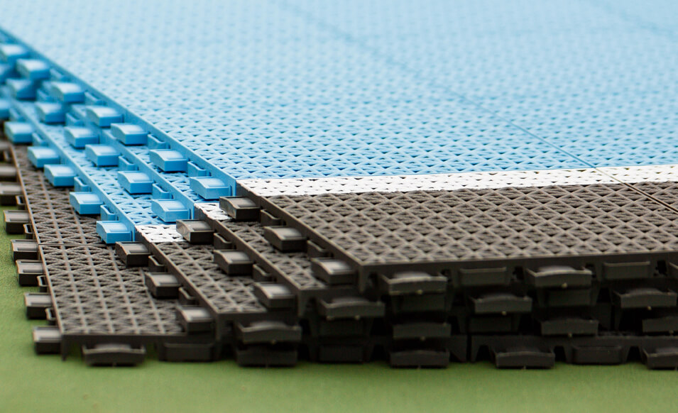 a closeup of pickleball court tile