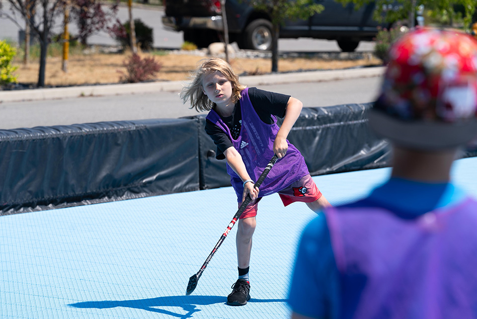 Photo of a young athlete playing hockey at Gretzky Hockey School