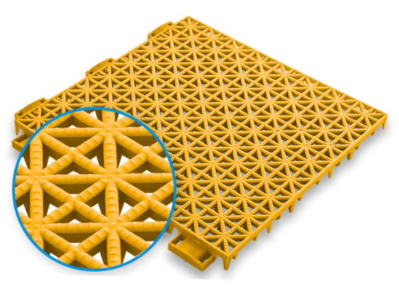 a yellow game outdoor game court tile with an inset closeup detailing the porous surface of the tile